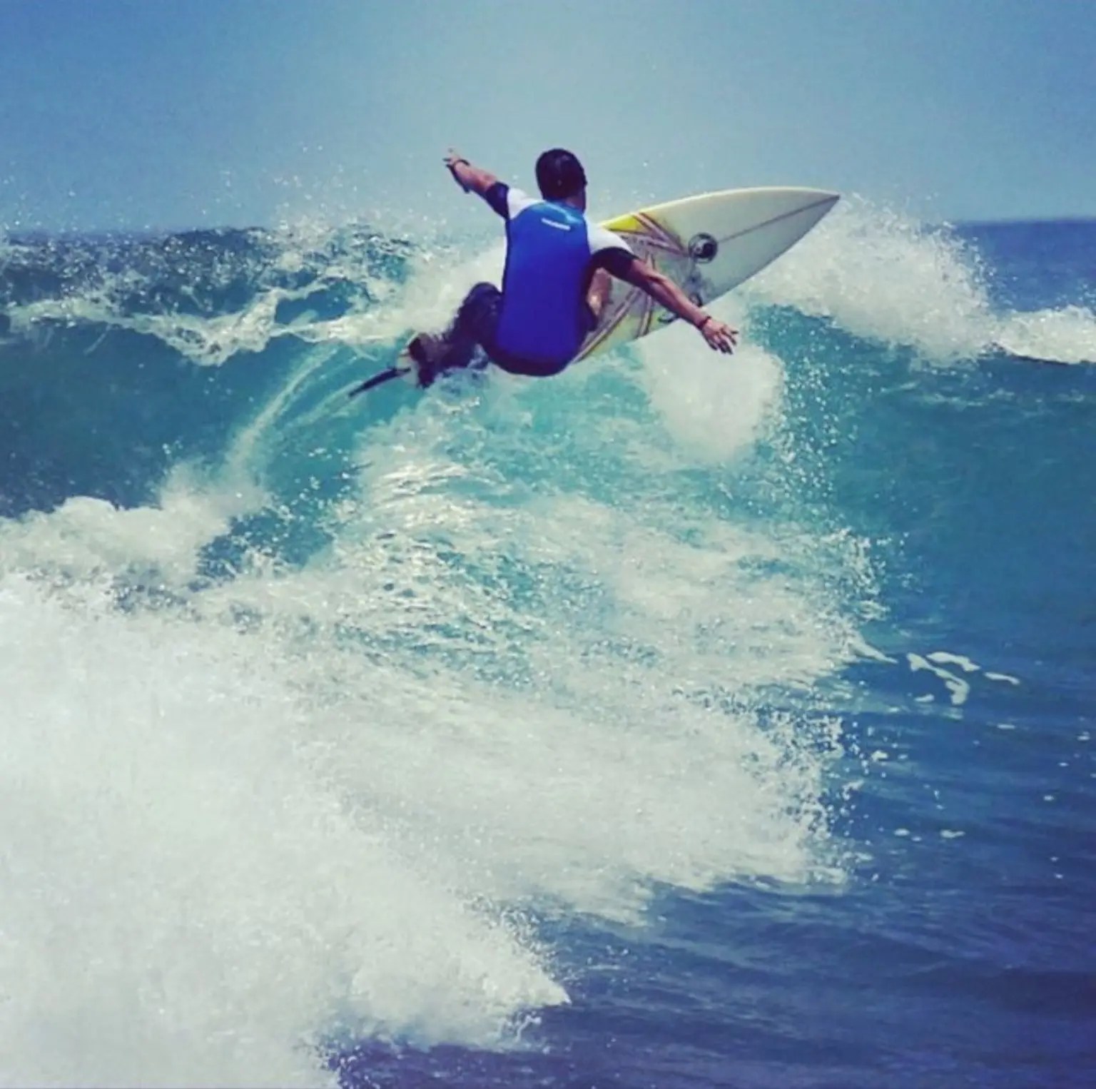 Daniel Luque surfing in Hawaii