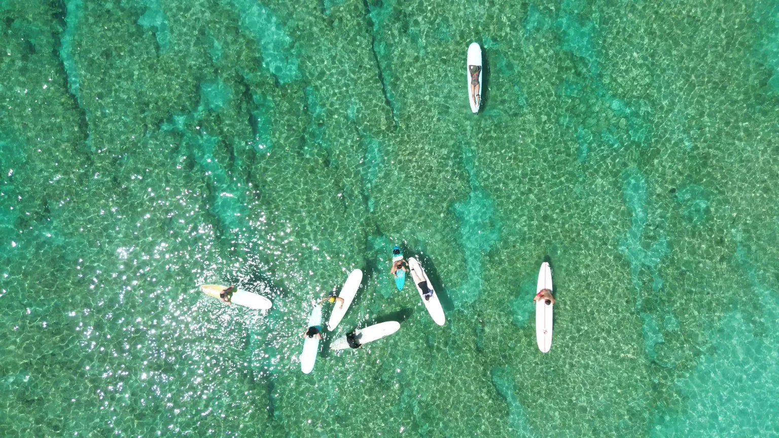 Surfing in clear blue Oahu water