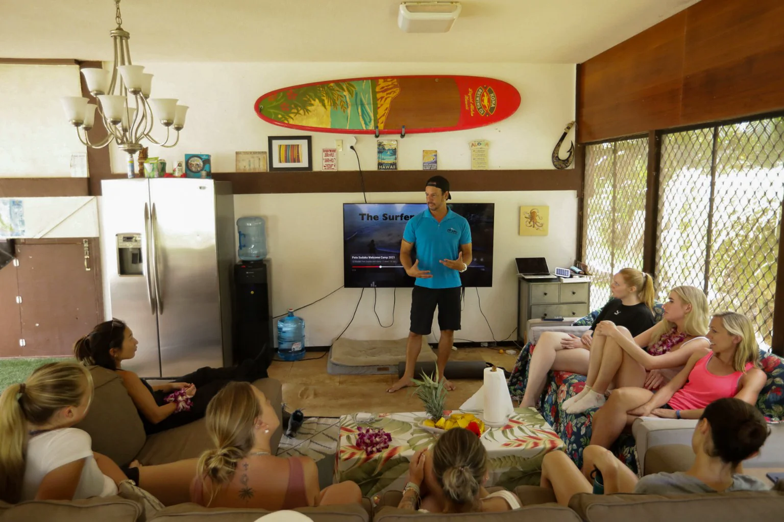 Daniel teaching surf theory and ocean knowledge to the camp group