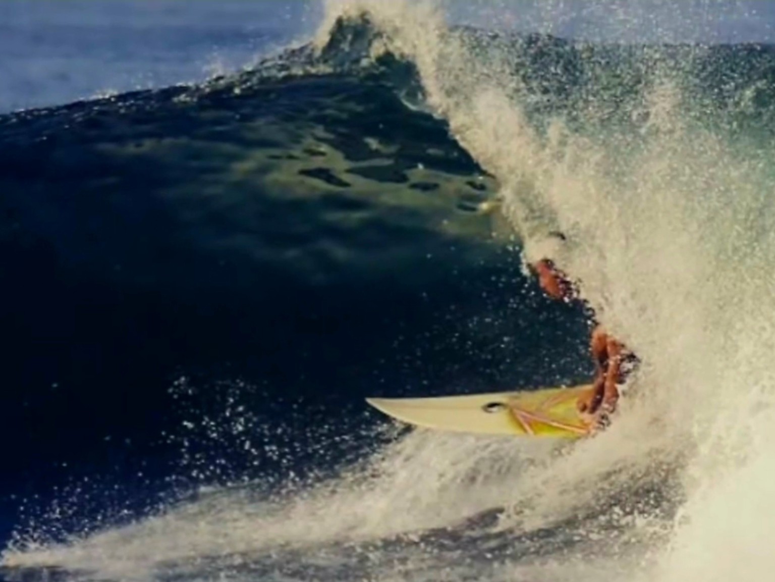 Daniel Luque surfing inside a barrel